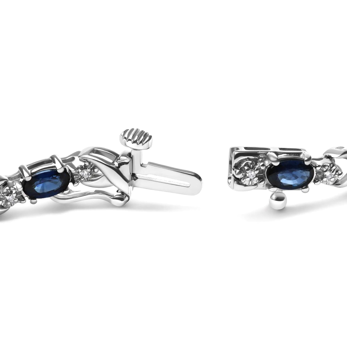 10K White Gold 5x4mm Oval Sapphire Gemstone and 1/10 Cttw Diamond Prong Set "X" Link Bracelet