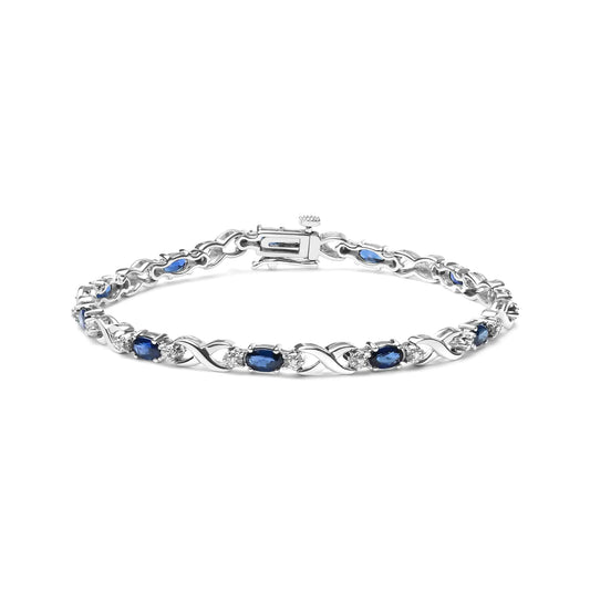 10K White Gold 5x4mm Oval Sapphire Gemstone and 1/10 Cttw Diamond Prong Set "X" Link Bracelet